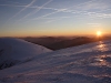 Coucher de soleil en hiver sur les Ballons des Vosges depuis le Rainkopf.